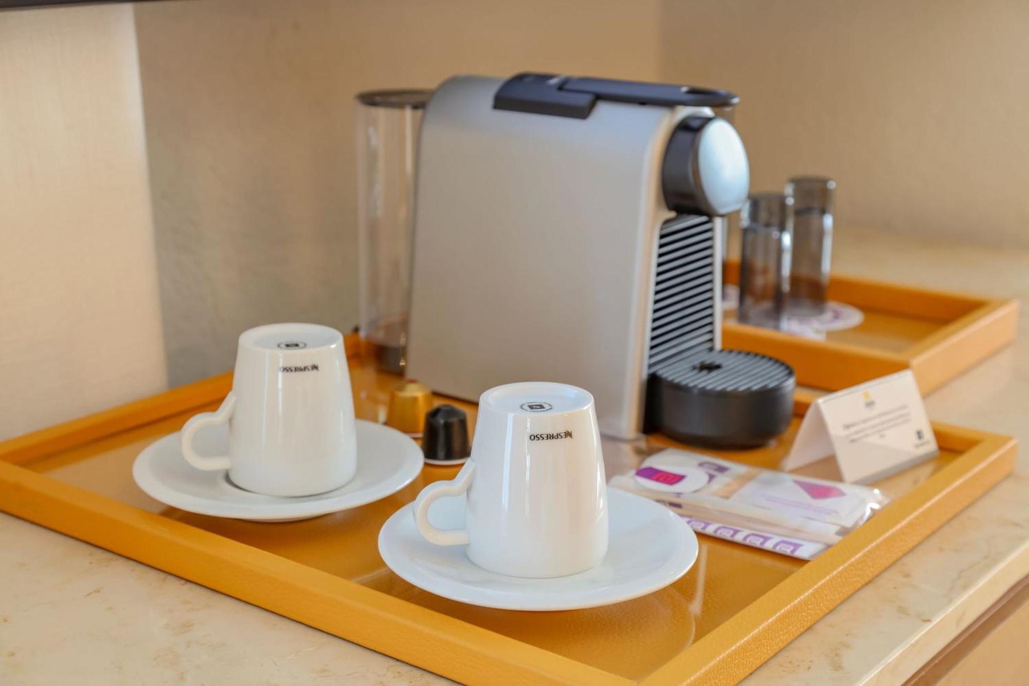 Camino Real Veracruz Exteriör bild A Nespresso coffee machine in a hotel room
